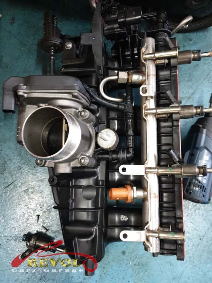 The Audi A4 intake manifold off the engine.
