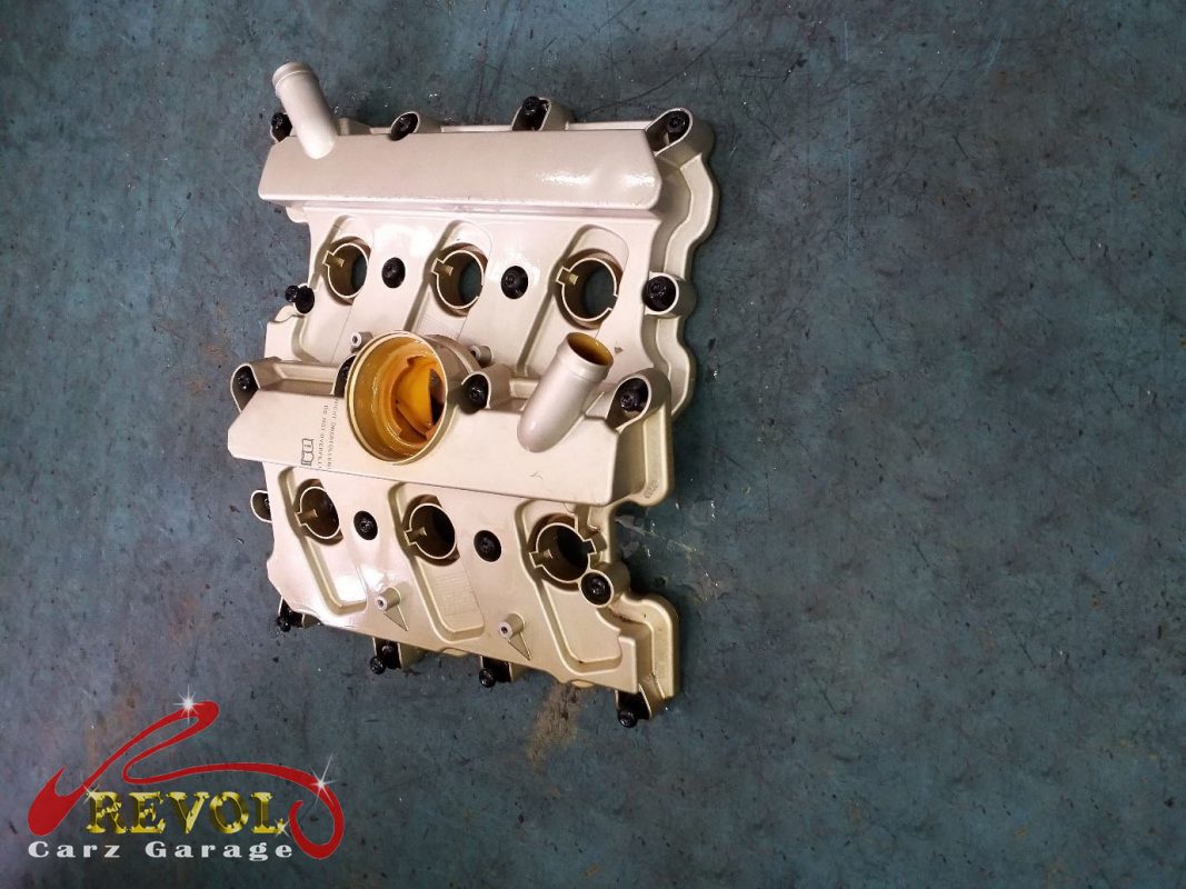 The old hardened valve cover gasket removed.