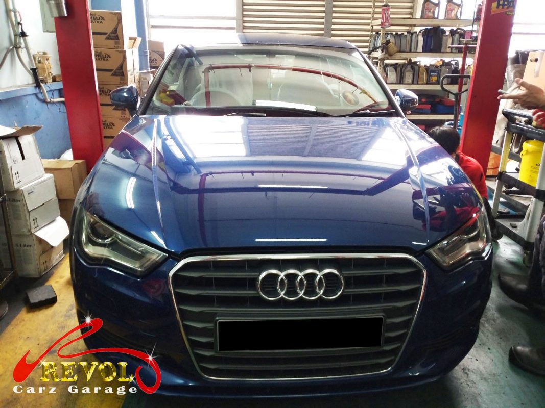 Audi A3 parked at the workshop for an interim service.