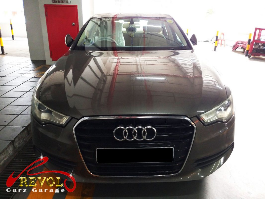 Audi A6 parked at the workshop, in for a crankshaft position sensor diagnosis.