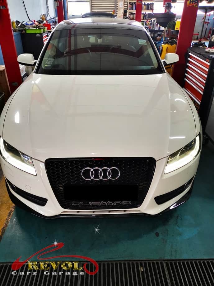 Audi A5 at the workshop, in rocking with a misfire and the check engine light on.