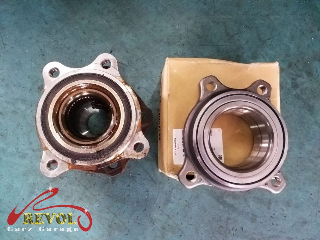 The corner stripped down to the worn wheel bearing.