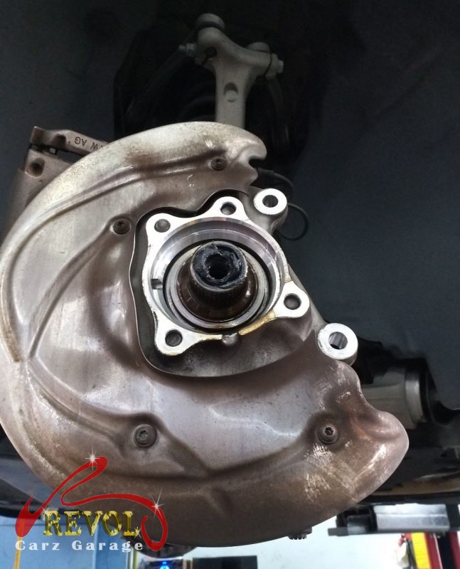 The old worn front wheel bearing pressed out of the hub.