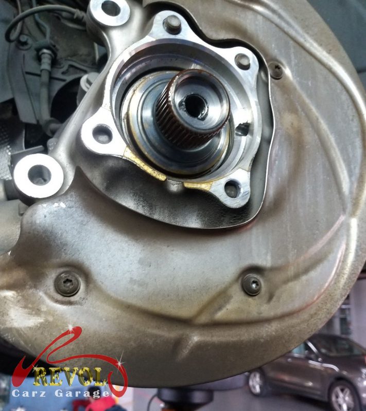 The new bearing pressed in and the corner reassembled to spec.