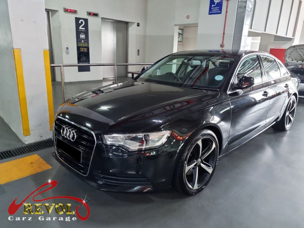 Audi A6 parked at the workshop, in for engine and transmission mount replacement.