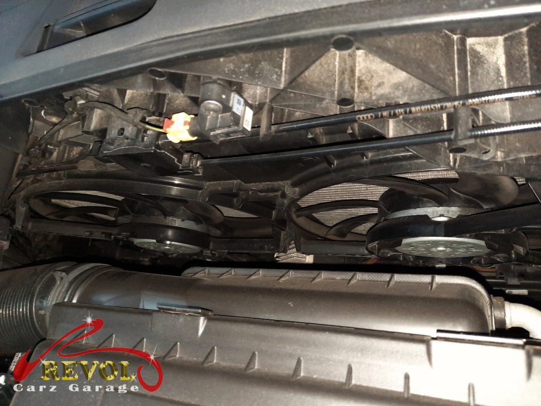 The cooling system checked on the Audi Q3, the fault traced to the dead radiator fans.