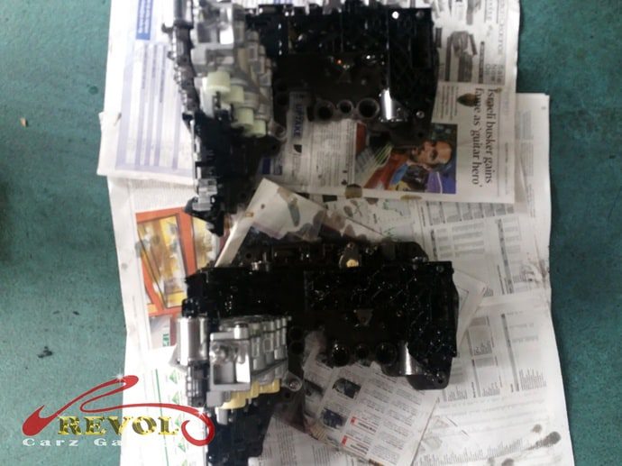 The new genuine Audi A6 gear control assembly awaiting fitment.