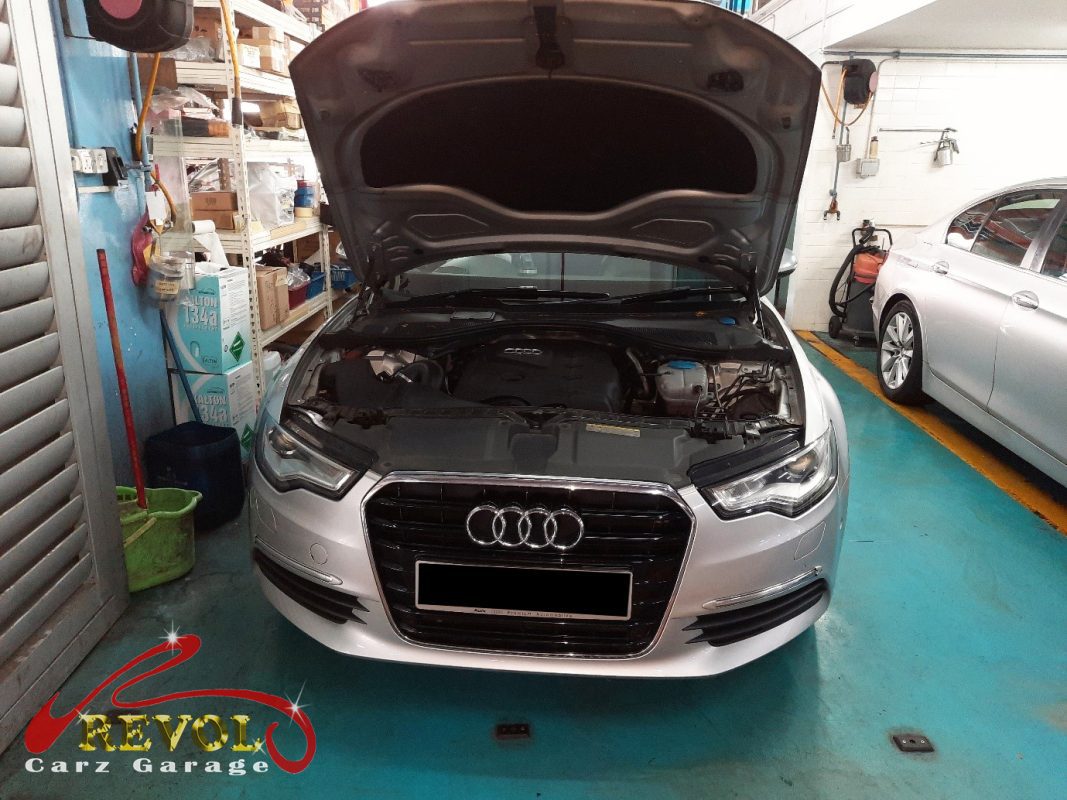 Audi A6 parked at the workshop, in for engine and transmission mount replacement.