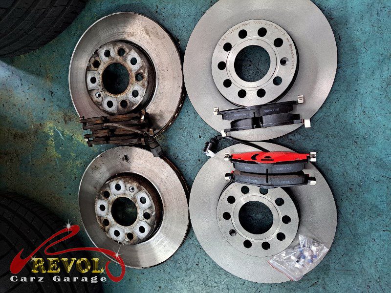 The new genuine Audi-spec front discs and pads ready to fit.