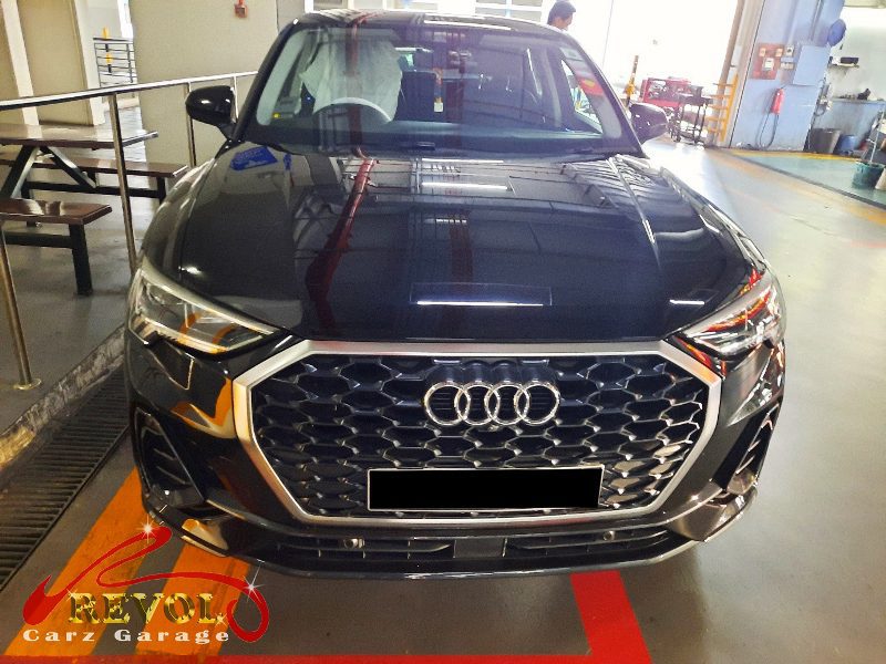 Audi Q3 parked at the workshop, in for air and cabin filter replacement.