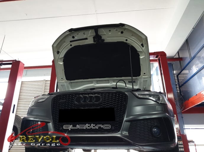 The Audi S5 lifted for a thorough inspection, coolant found in the engine oil.