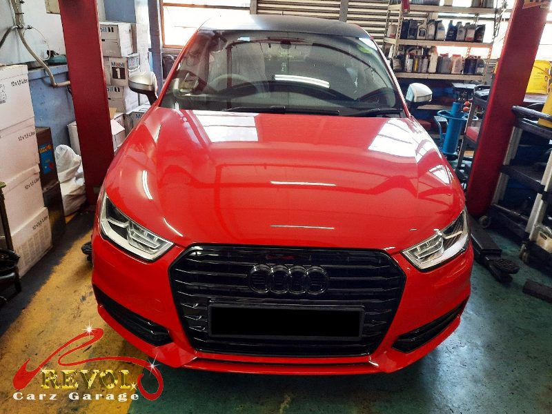 Audi A1 parked at the workshop, in for front brake inspection.
