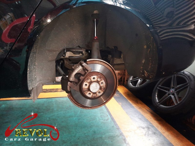 The worn front pads removed, the discs measured and still serviceable.