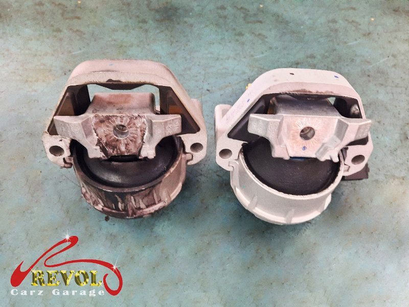 The gearbox mount removed showing the play under load.