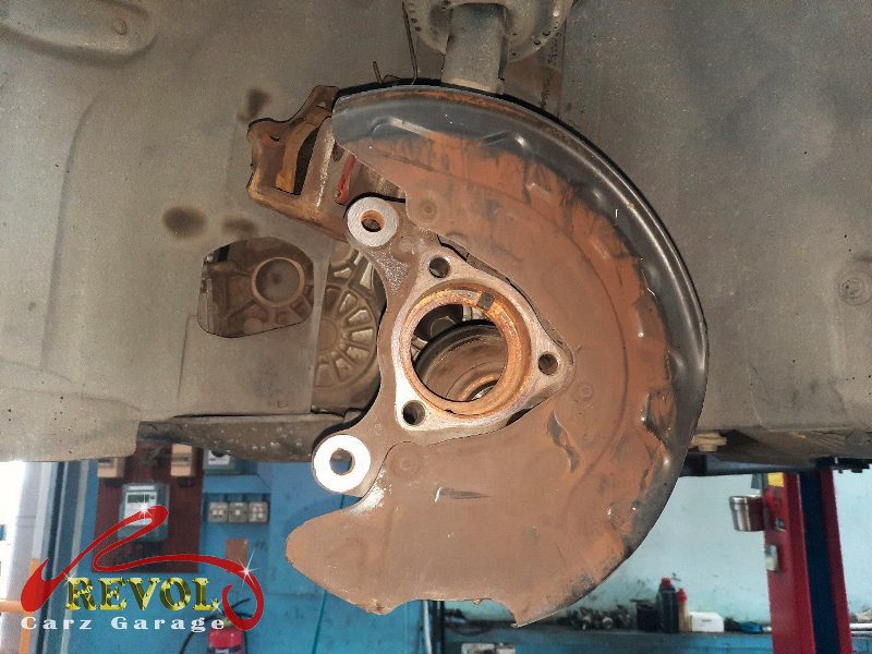 The old worn front wheel bearing removed from the hub.