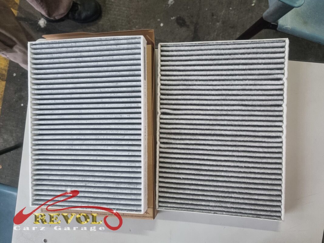 The new cabin filter (left, still boxed) next to the old one (right), fitted to seal off any trace of the musty smell.
