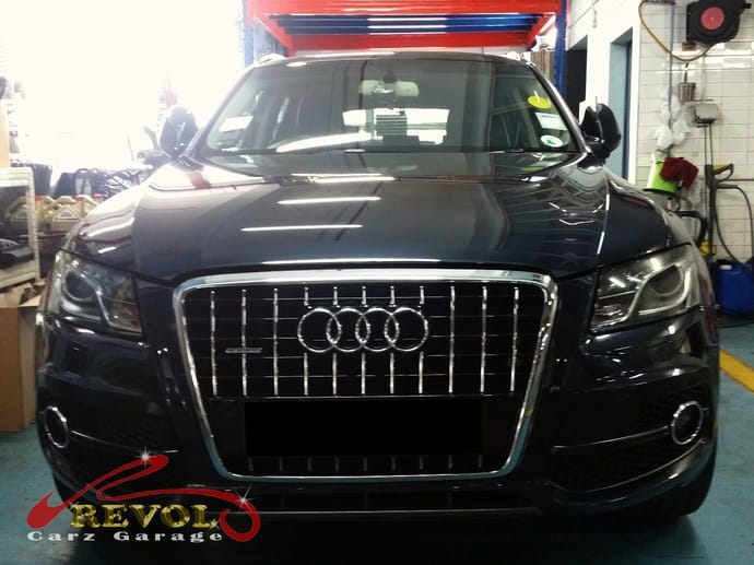 Audi Q5 at the workshop, in for a low-oil warning and a brake noise.