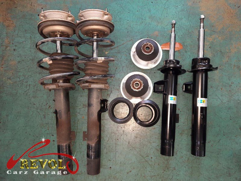 The new genuine BMW-spec front struts ready to fit.