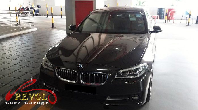 BMW 528i parked at the workshop, in for an oil leak diagnosis.