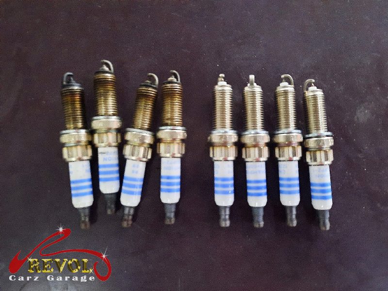 A full set of new genuine BMW-spec coils and plugs ready to fit.