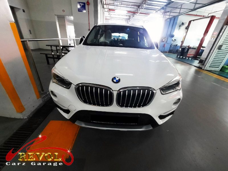 BMW X1 parked at the workshop, in for a starter motor diagnosis.