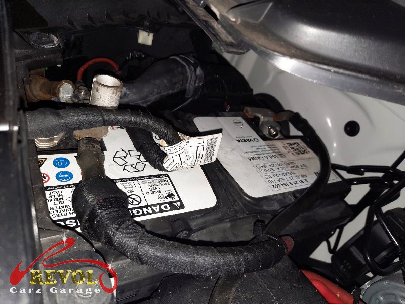 The old tired battery removed from the car.