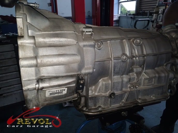 The BMW 318i checked, the oil leak traced to the flywheel oil seal.