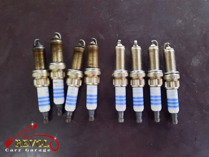 A full set of new genuine BMW-spec coils and plugs ready to fit.