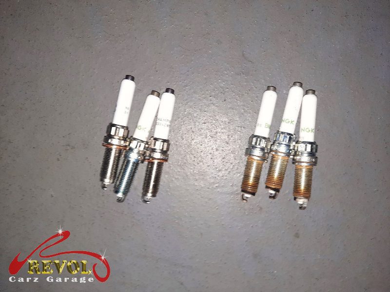 A full set of new genuine BMW-spec coils and plugs ready to fit.