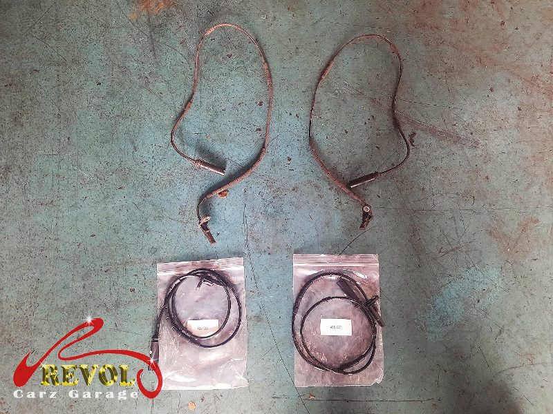 The old ABS sensor removed from the hub.
