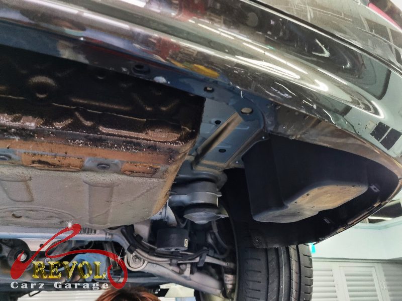 The loose metal cover with its fixings worked free.