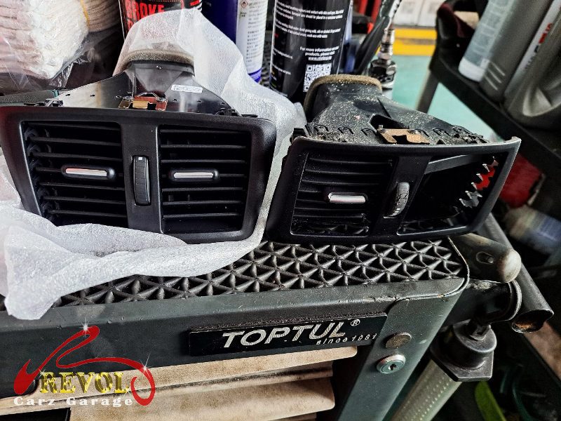 The failed rear aircon blower removed from the BMW 216i and the new assembly fitted and tested.
