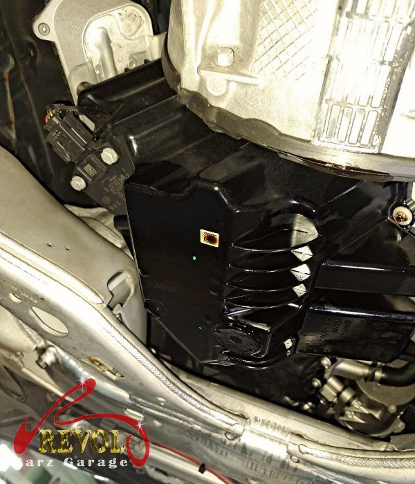 The oil filter housing removed showing the hardened gasket.