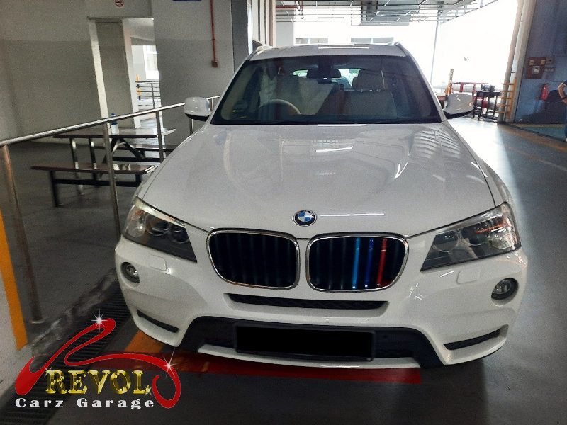 BMW X3 parked at the workshop, in for aircon evaporator replacement.