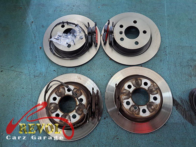 The new genuine BMW-spec front discs and pads ready to fit.