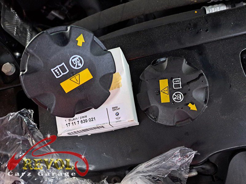 The old expansion tank with its failed level sensor removed.