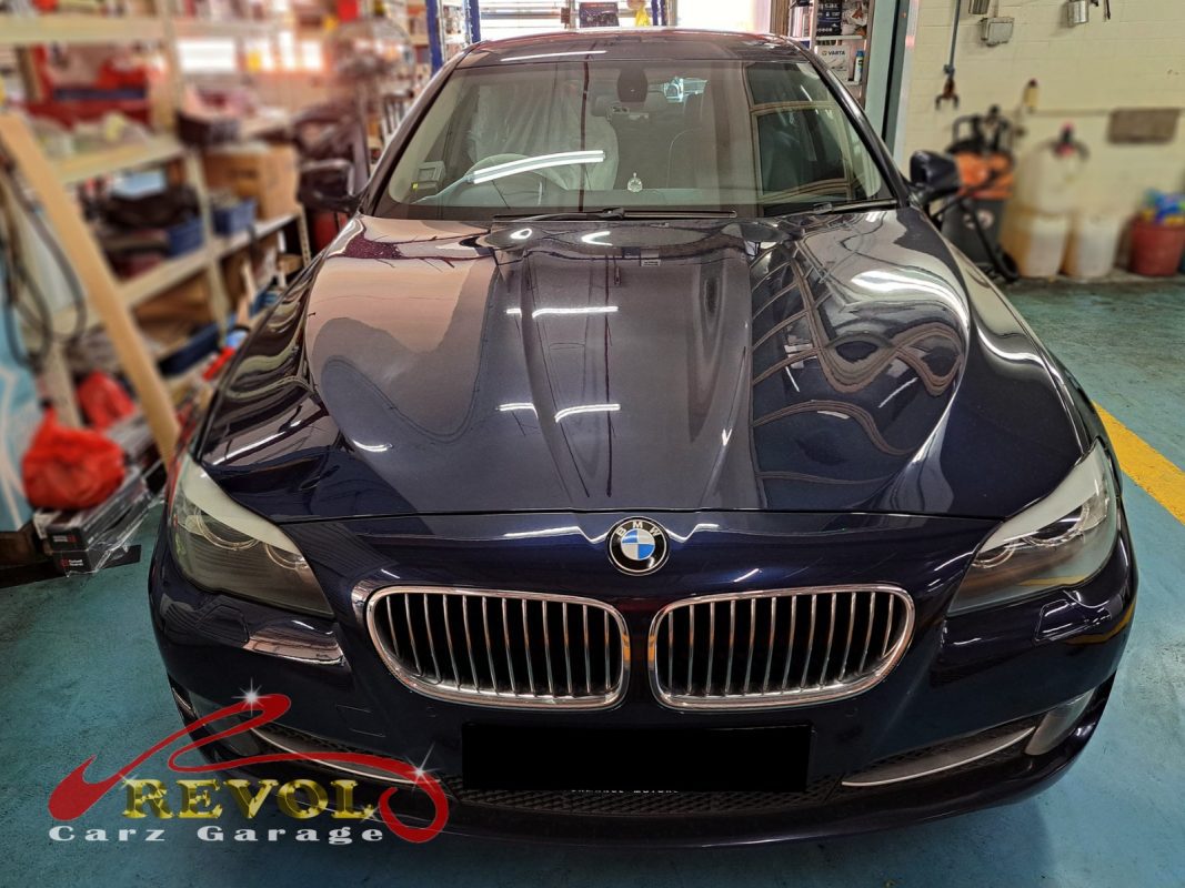 BMW 523i parked at the workshop, in for a battery and charging diagnosis.
