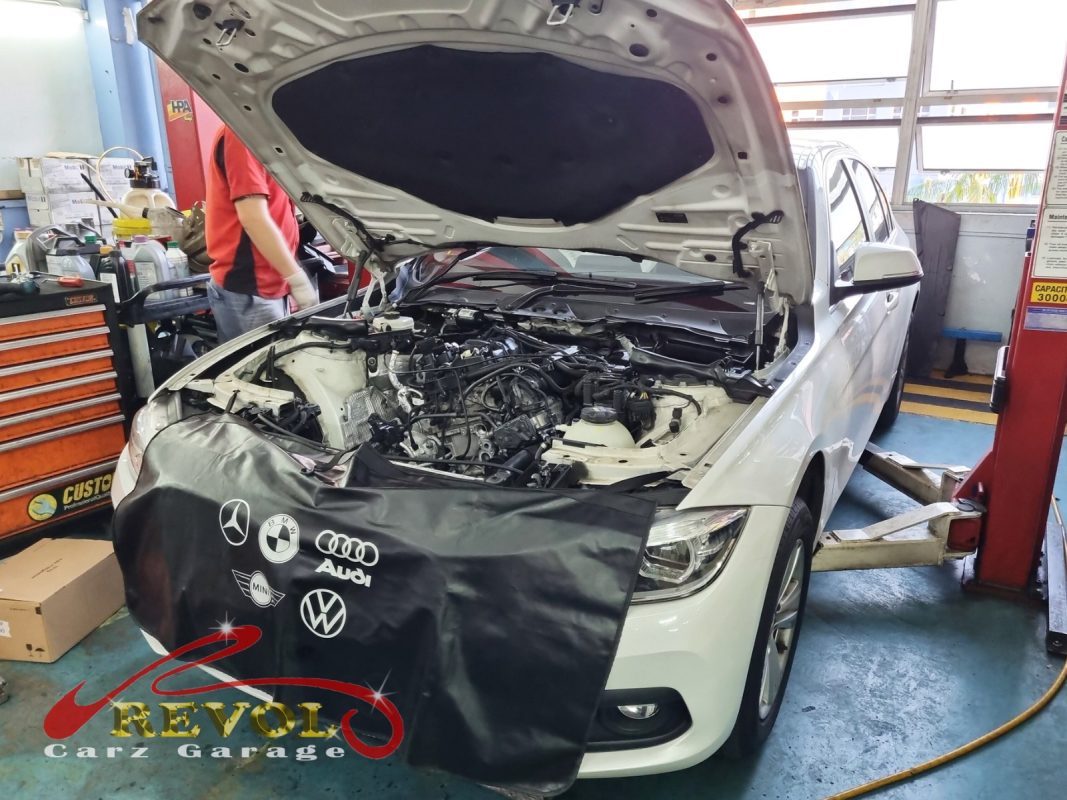 The cooling system checked on the BMW 318i with the engine overheating.