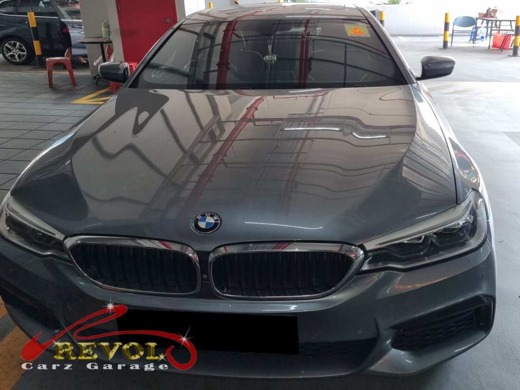 BMW 540i parked at the workshop for a transmission fluid service.