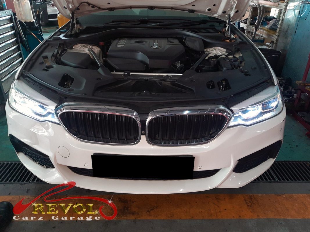 BMW 530i parked at the workshop, in for cooling system inspection.