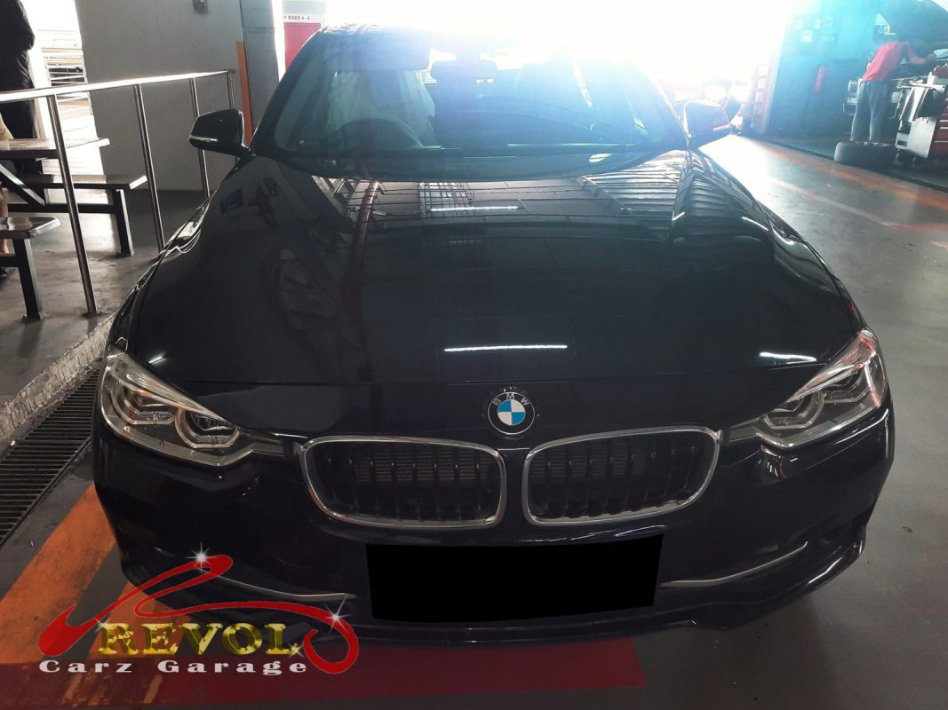BMW 318i parked at the workshop, in for misfire diagnosis.