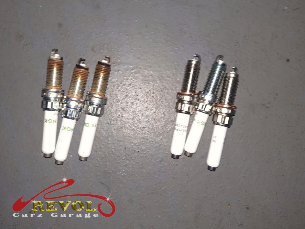 The new BMW-spec ignition coils and spark plugs ready to fit.