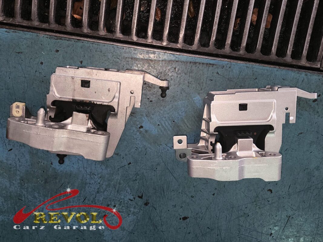 The gearbox mount removed showing the play under load.