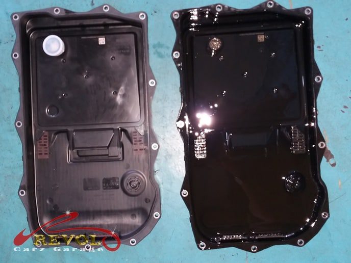 The mechatronic, the BMW gear control unit, visible with the transmission pan off.