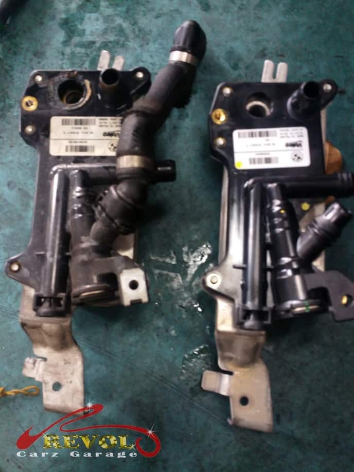 The transmission pan being replaced along with the filter and fluid.
