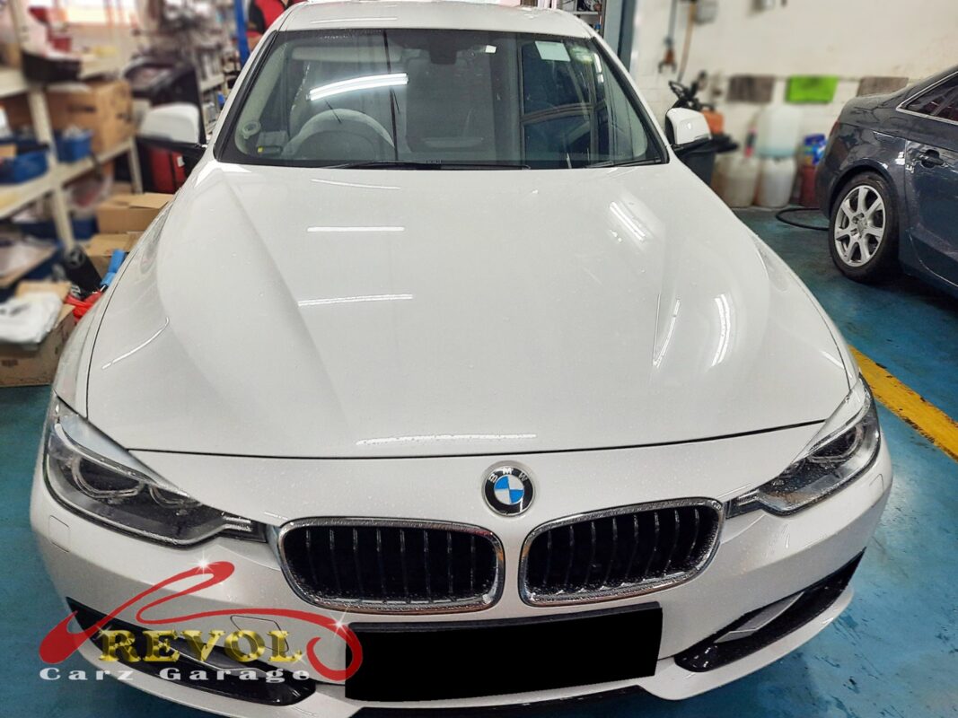 BMW 316i parked at the workshop, in for a flywheel oil seal repair.