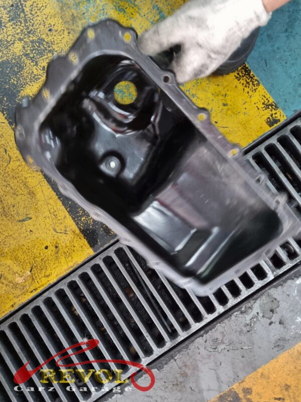 The sump reinstalled and the underside cleaned up.
