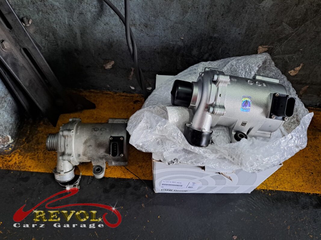 The new BMW-spec water pump and thermostat ready to fit.