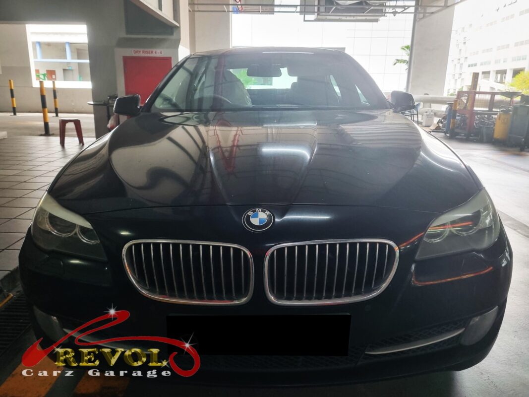 BMW 520i parked at the workshop, in for a transmission fluid and pan service.