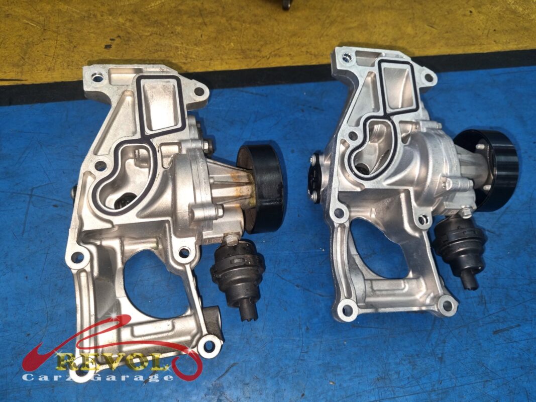 The new BMW-spec water pump housing, pump and thermostat ready to fit.